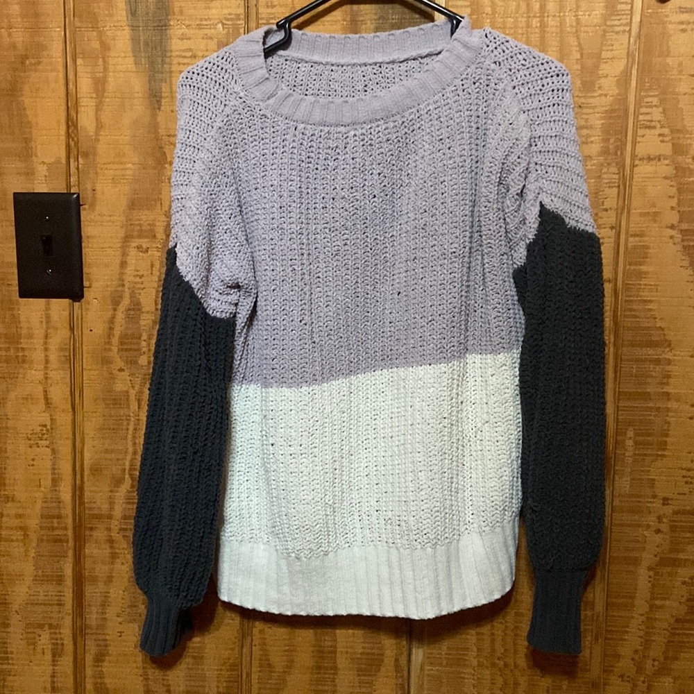 Purple, white, and dark grey sweater